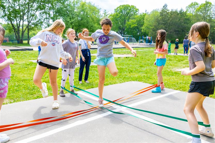 Students dance outside